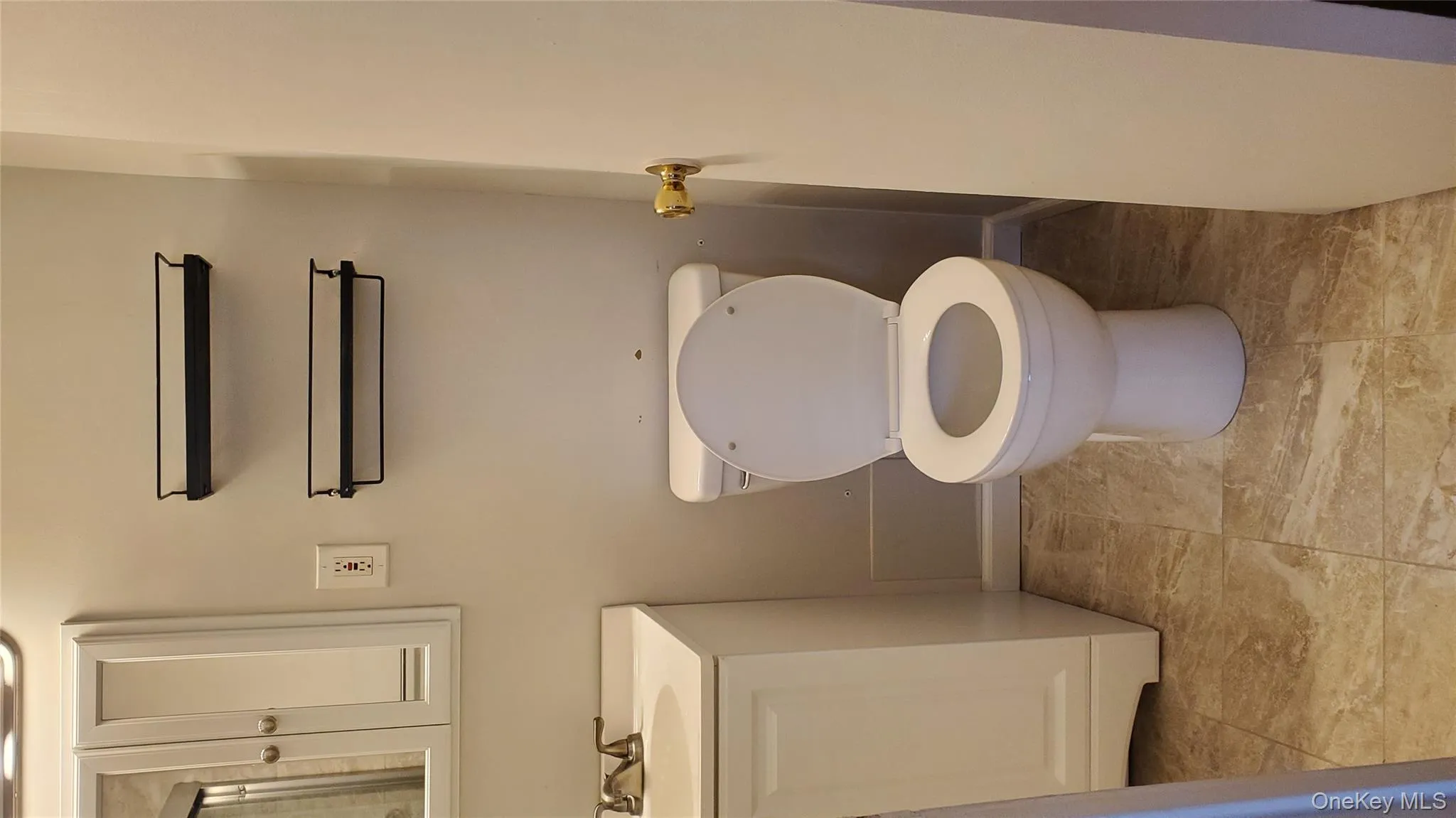 Bathroom with vanity and a shower with door Bathroom with vanity and a shower with door