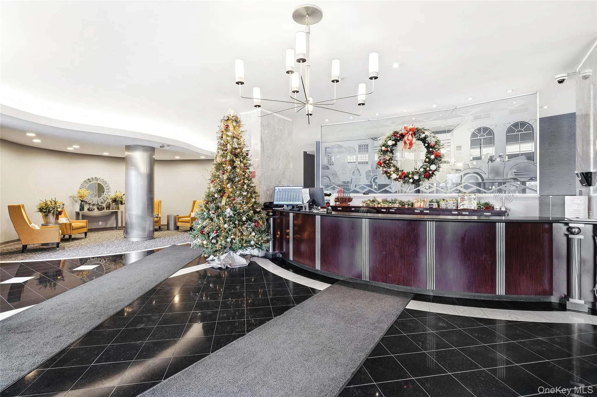 Welcome area with recessed lighting, arched walkways, and ornate columns Welcome area with recessed lighting, arched walkways, and ornate columns