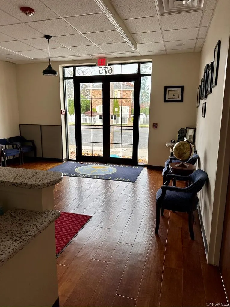 Lobby with reception desk and seating Lobby with reception desk and seating