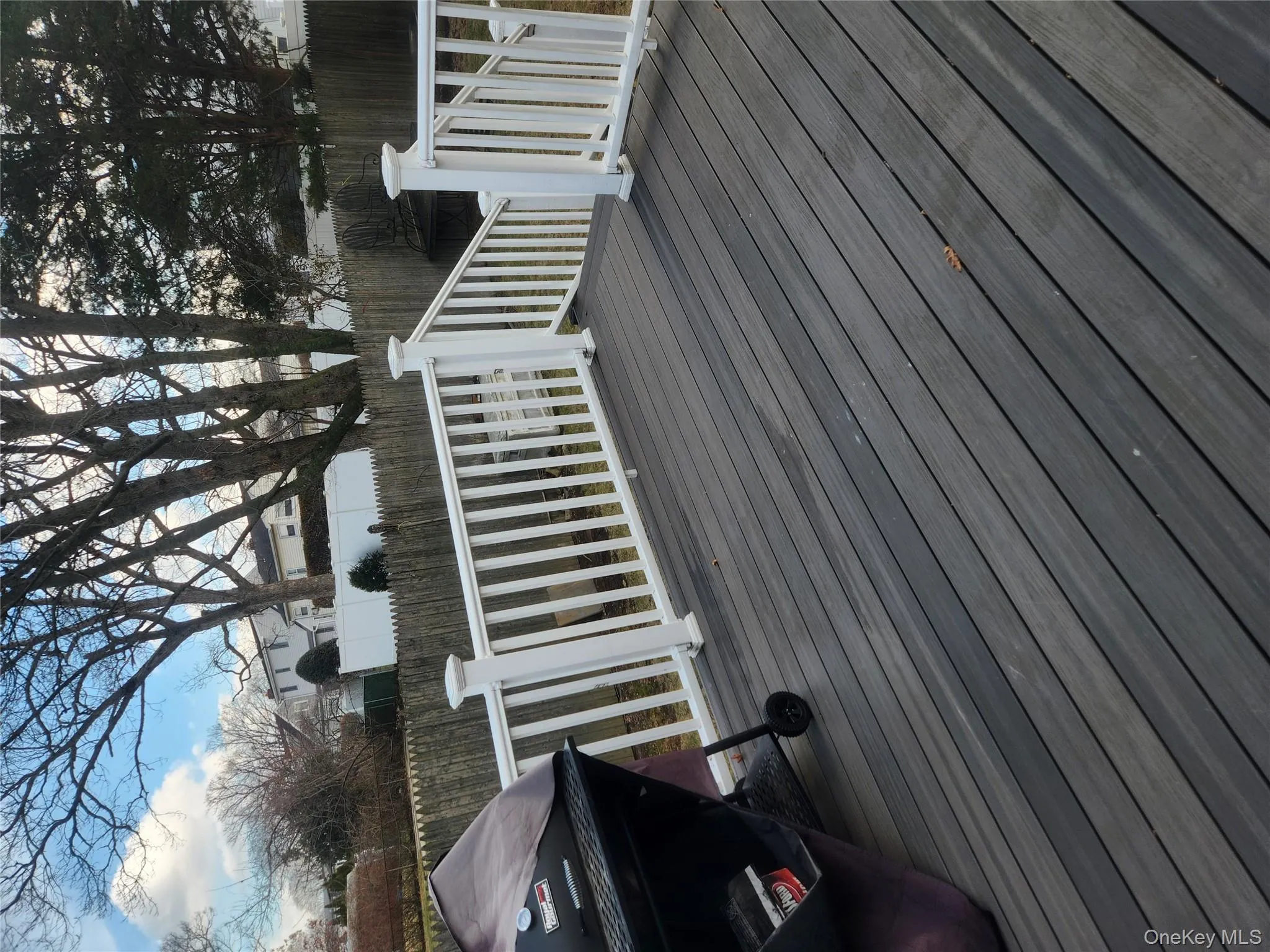 Deck with a fenced backyard and grilling area Deck with a fenced backyard and grilling area