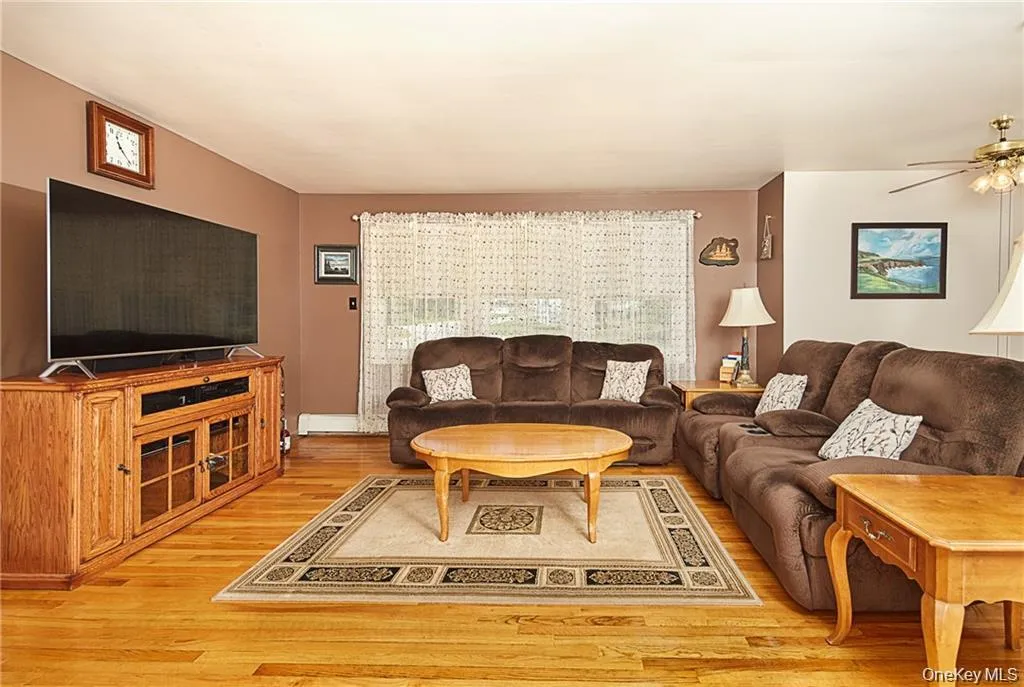 Living room with light wood-style floors Living room with light wood-style floors