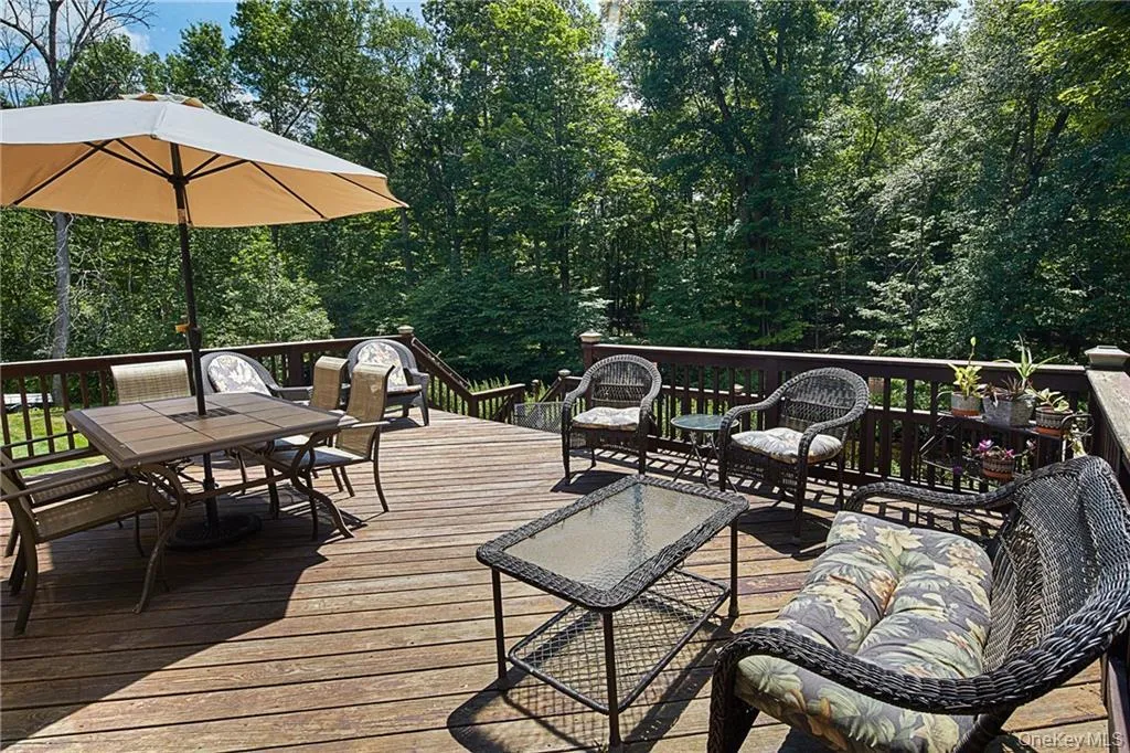 Deck featuring outdoor dining area Deck featuring outdoor dining area