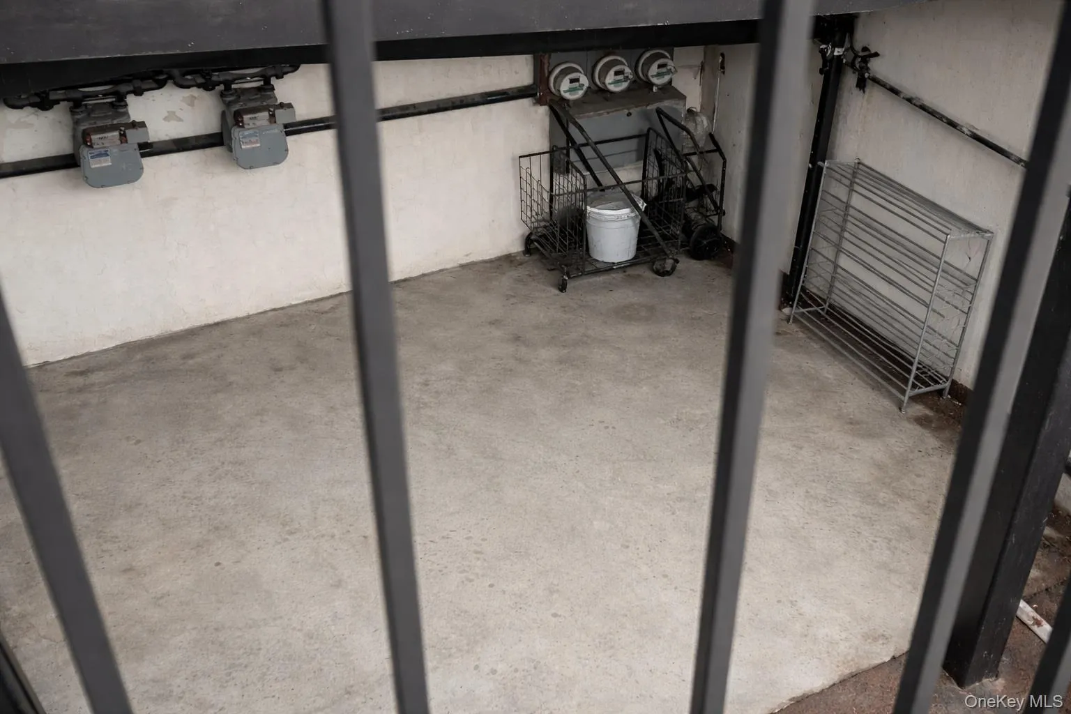 Unfinished below grade area featuring gas meter Unfinished below grade area featuring gas meter