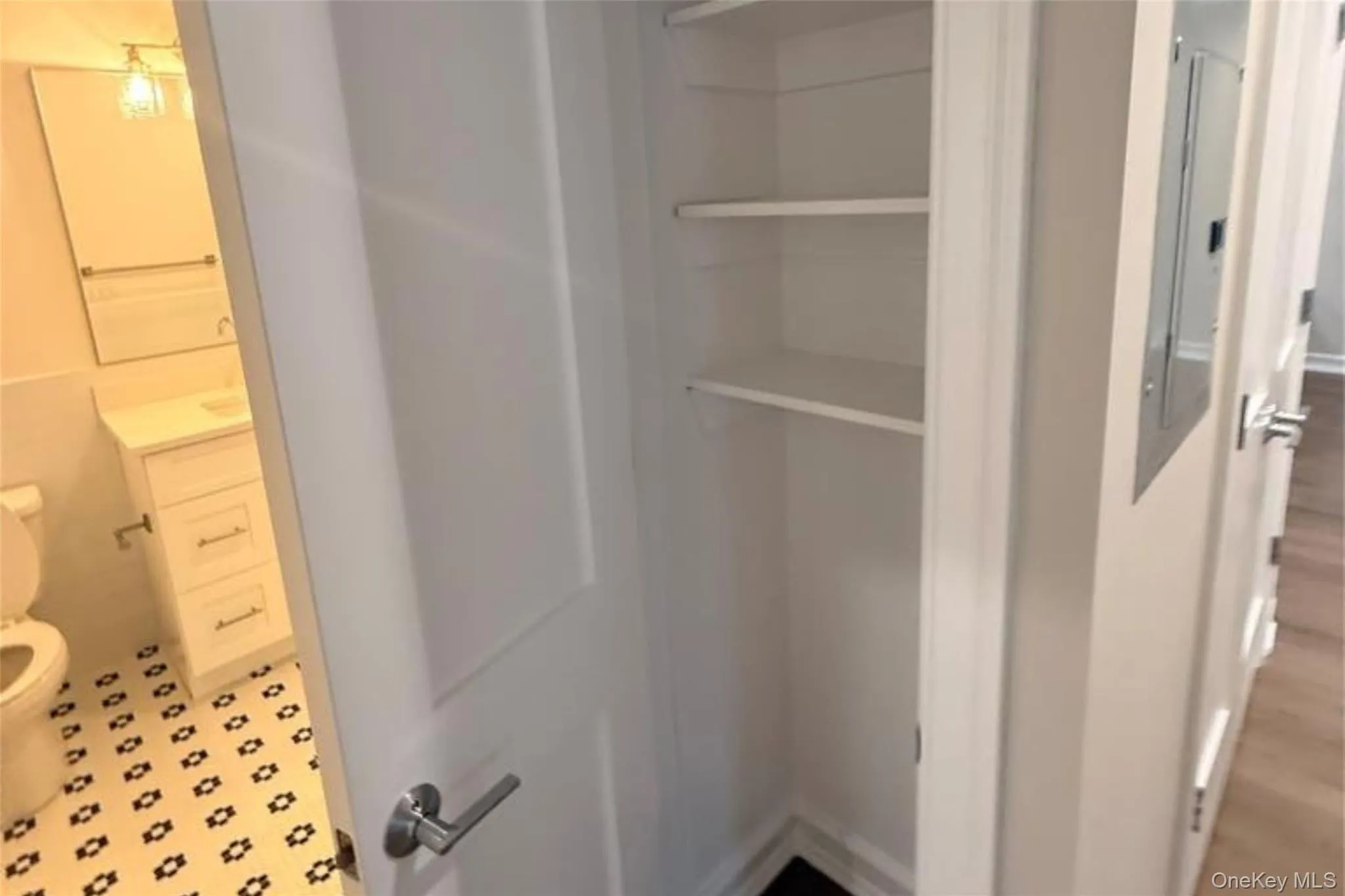 Closet featuring electric panel Closet featuring electric panel