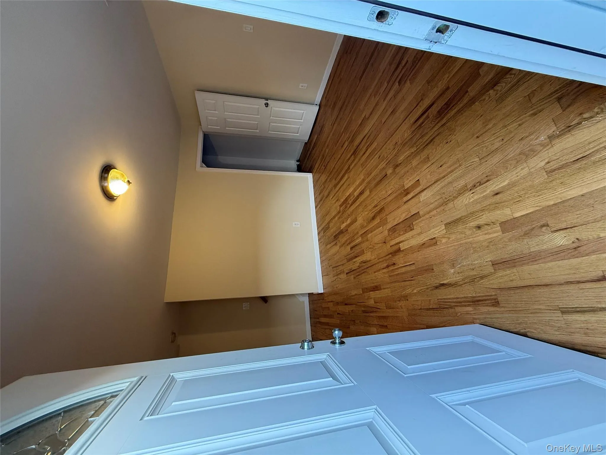 Spare room featuring light wood-style flooring and baseboards Spare room featuring light wood-style flooring and baseboards