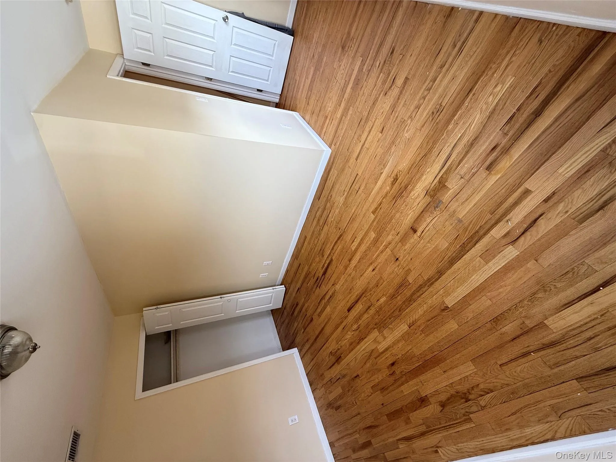 Unfurnished bedroom with light wood-style floors and a closet Unfurnished bedroom with light wood-style floors and a closet