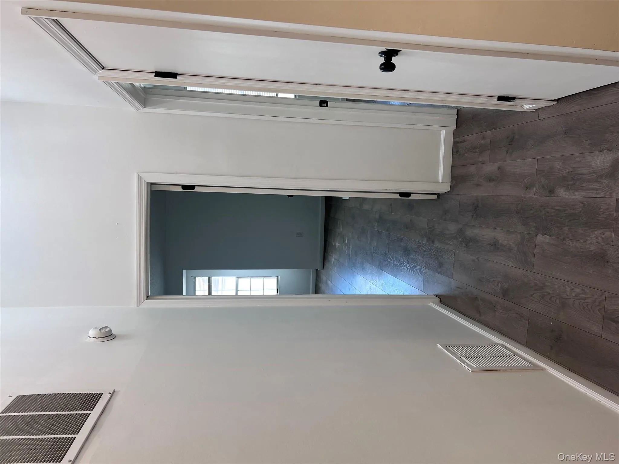 Hall with dark wood-type flooring Hall with dark wood-type flooring