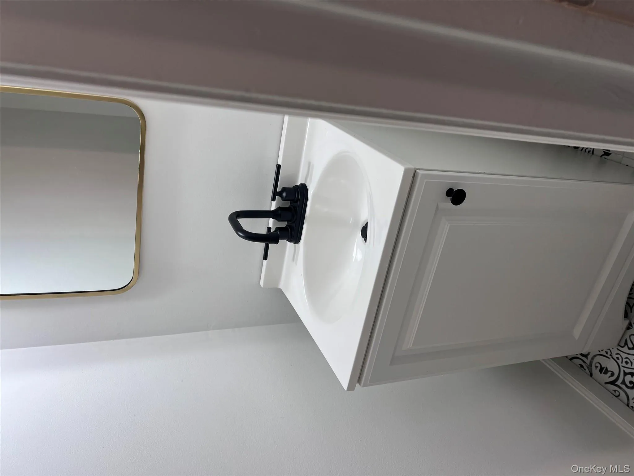 Bathroom featuring vanity Bathroom featuring vanity