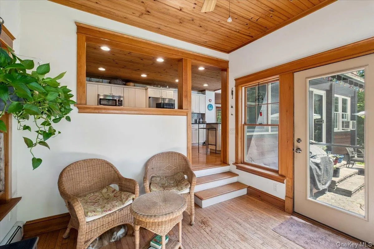 Sun room with door to patio Sun room with door to patio