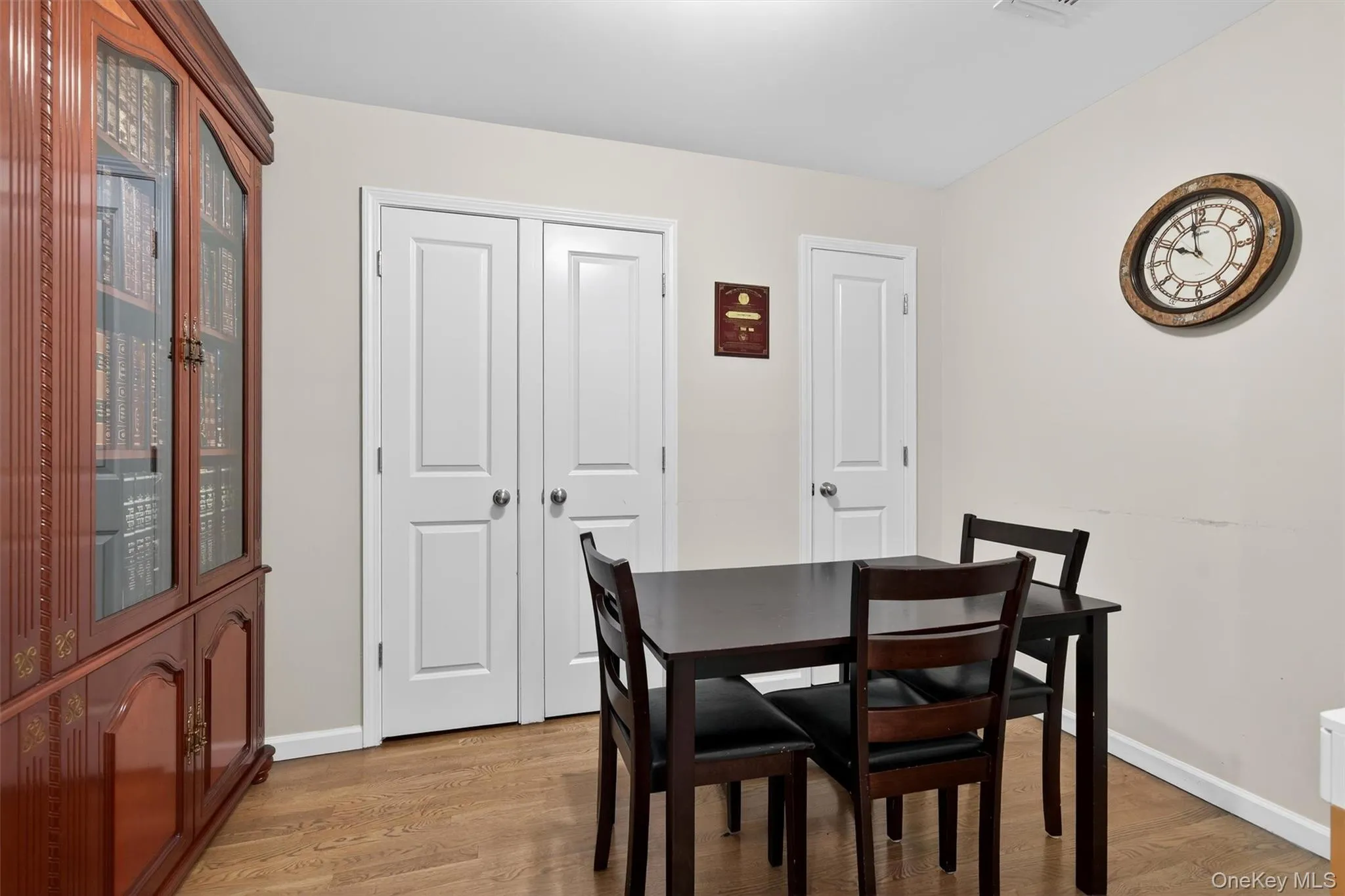 Office room featuring light wood-style flooring and baseboards Office room featuring light wood-style flooring and baseboards