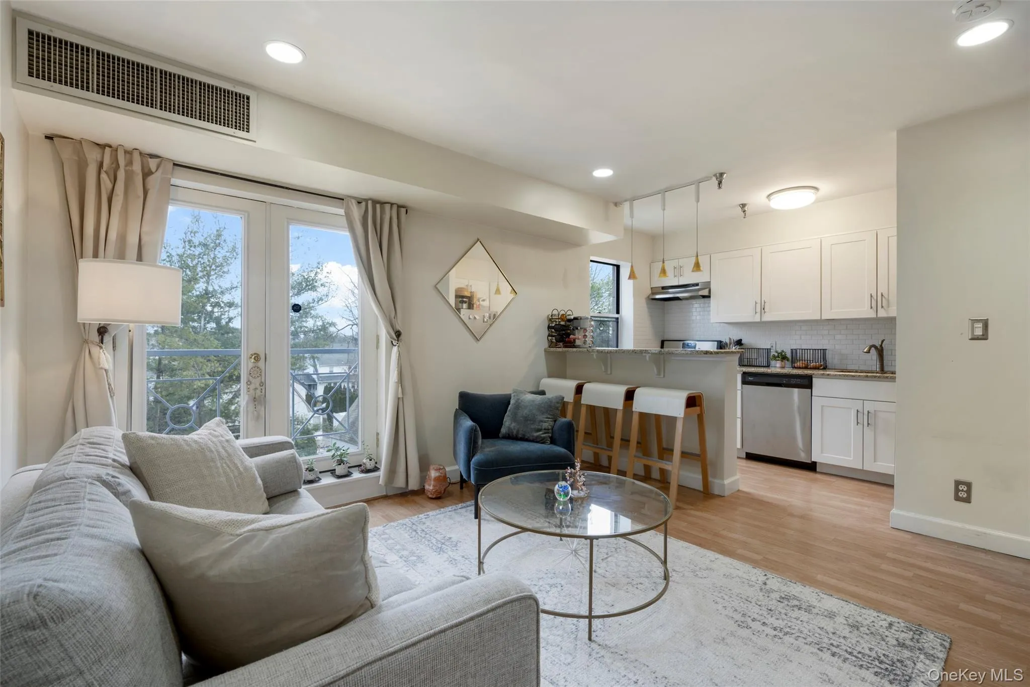 The Juliet balcony welcomes the light. The Juliet balcony welcomes the light.