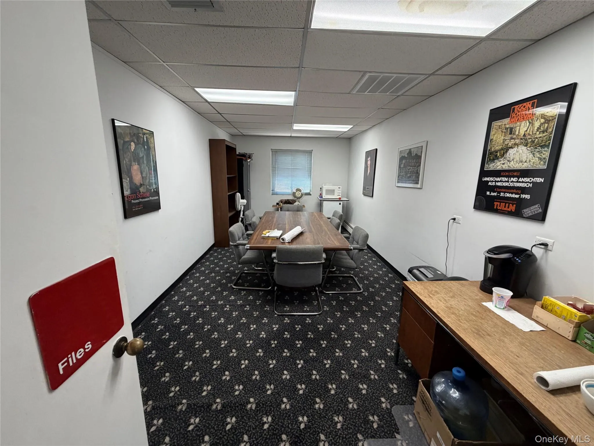 Office featuring a drop ceiling Office featuring a drop ceiling