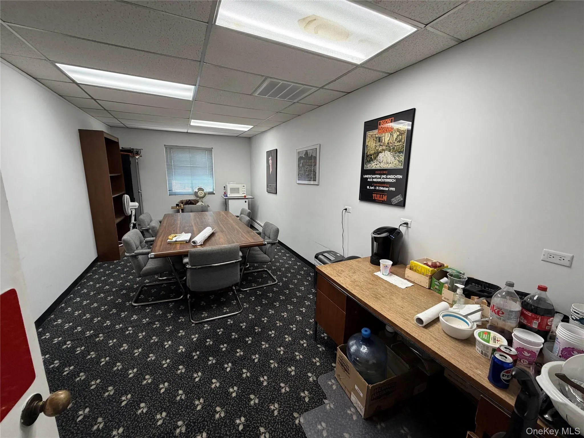 Office featuring a drop ceiling Office featuring a drop ceiling