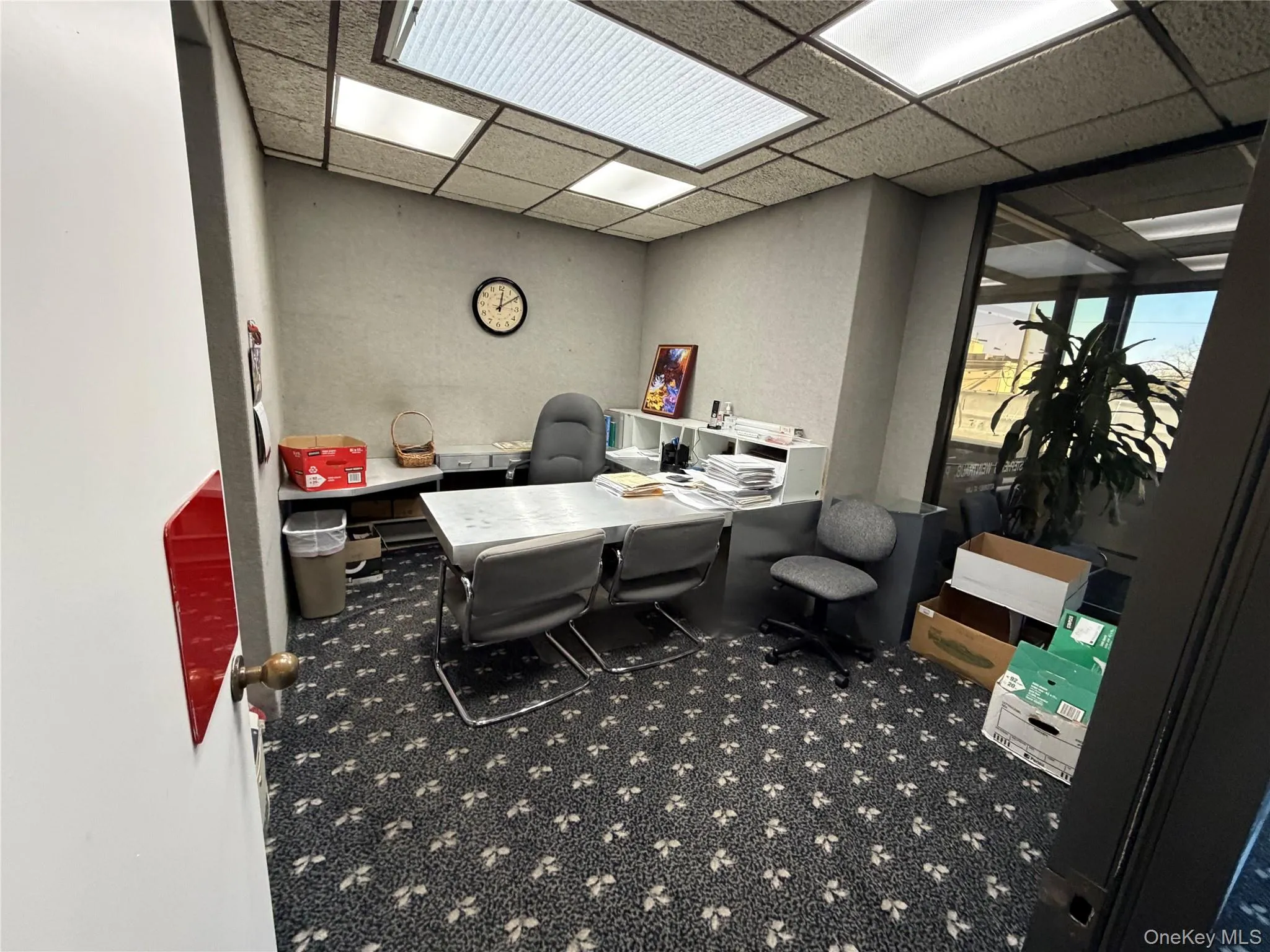 Office area with a drop ceiling Office area with a drop ceiling