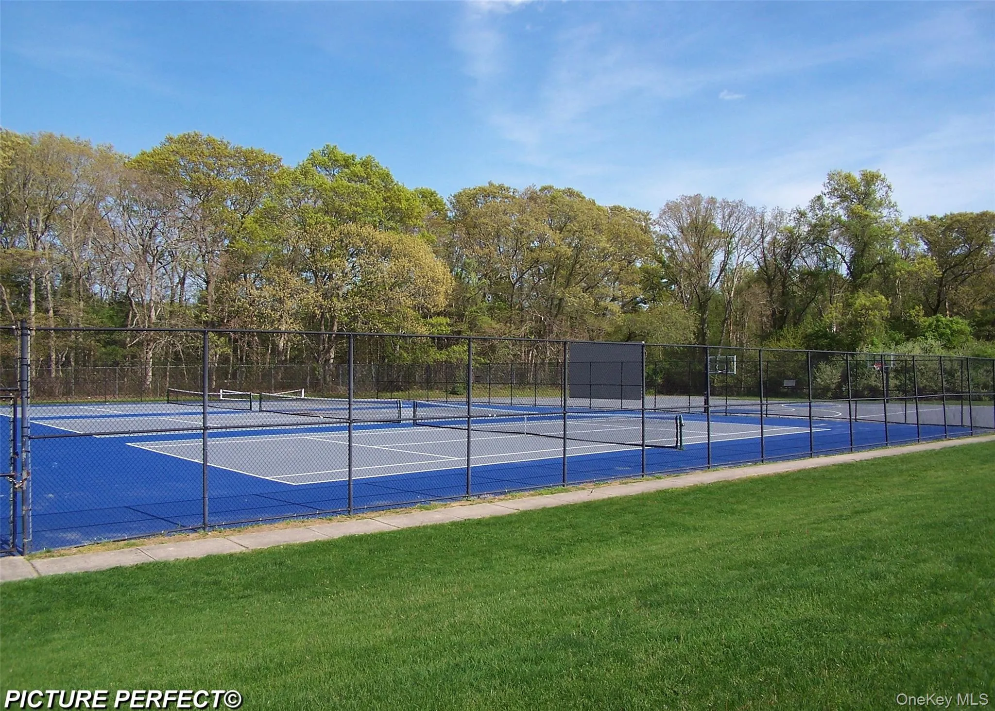 View of tennis court View of tennis court