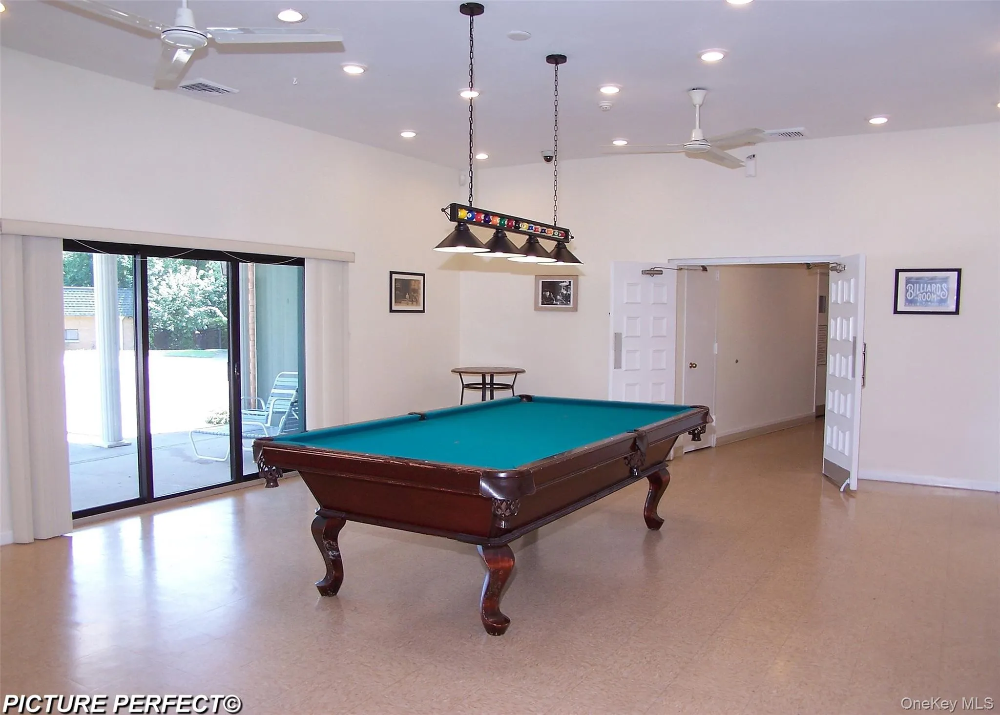 Game room with ceiling fan, billiards, and recessed lighting Game room with ceiling fan, billiards, and recessed lighting