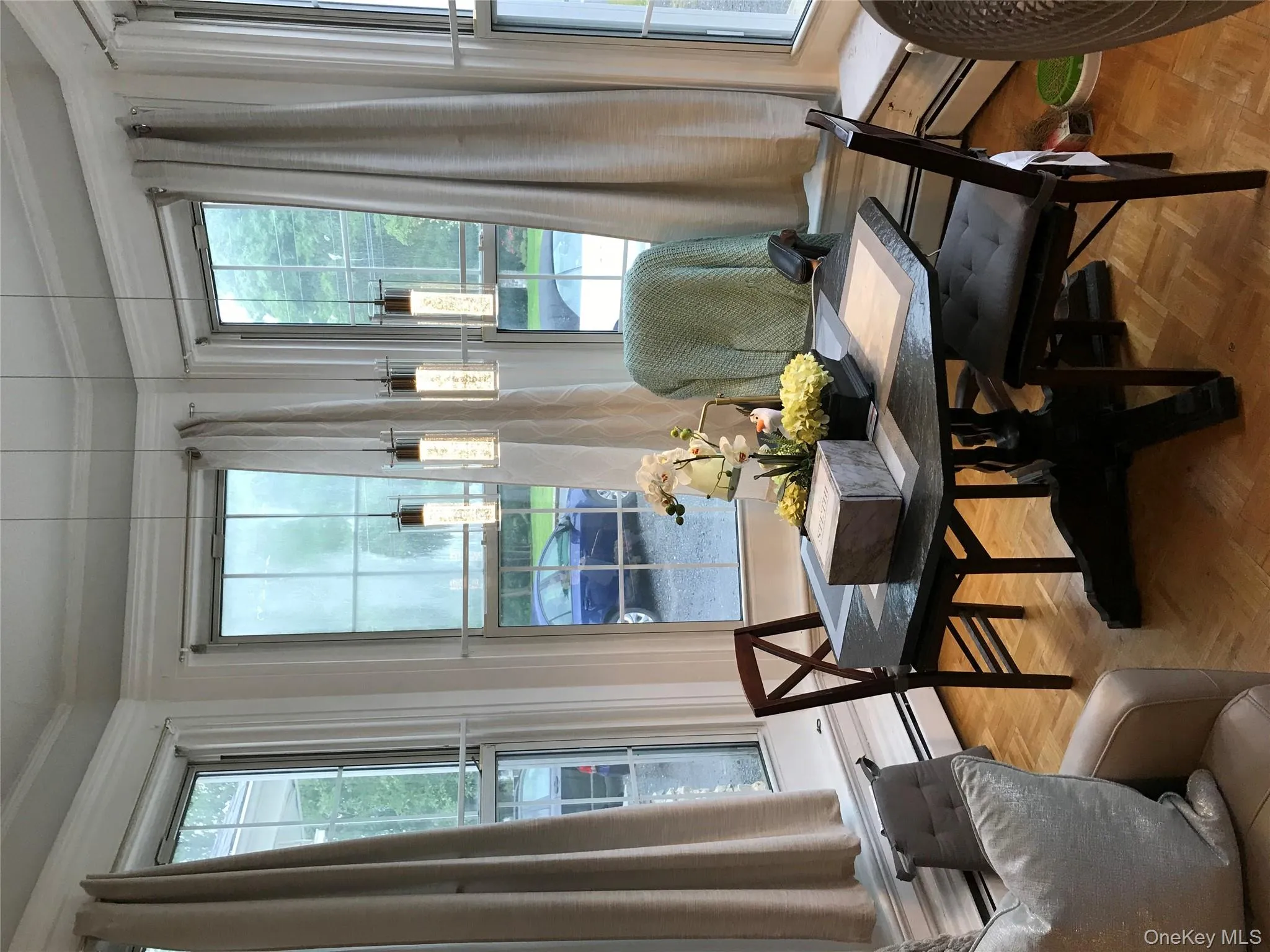 Dining space with crown molding, healthy amount of natural light, baseboard heating, and a baseboard heating unit Dining space with crown molding, healthy amount of natural light, baseboard heating, and a baseboard heating unit