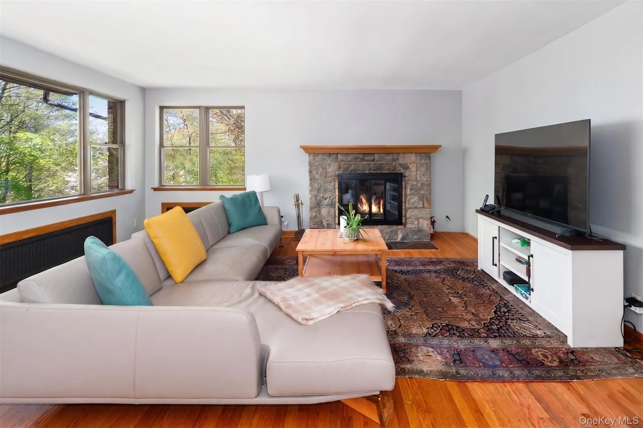 Living Room with Stone Fireplace Living Room with Stone Fireplace
