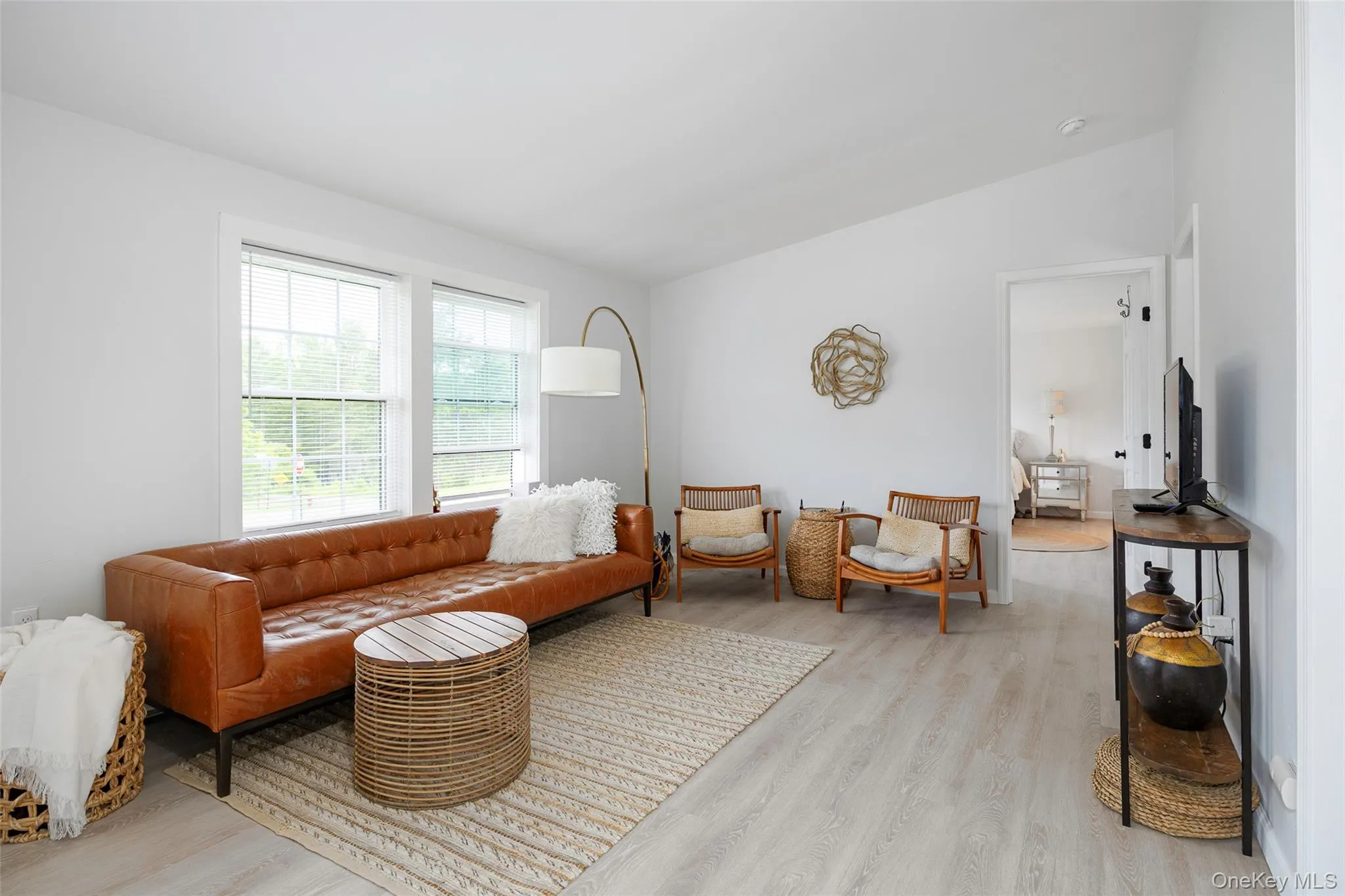 Living room with light wood-style floors Living room with light wood-style floors