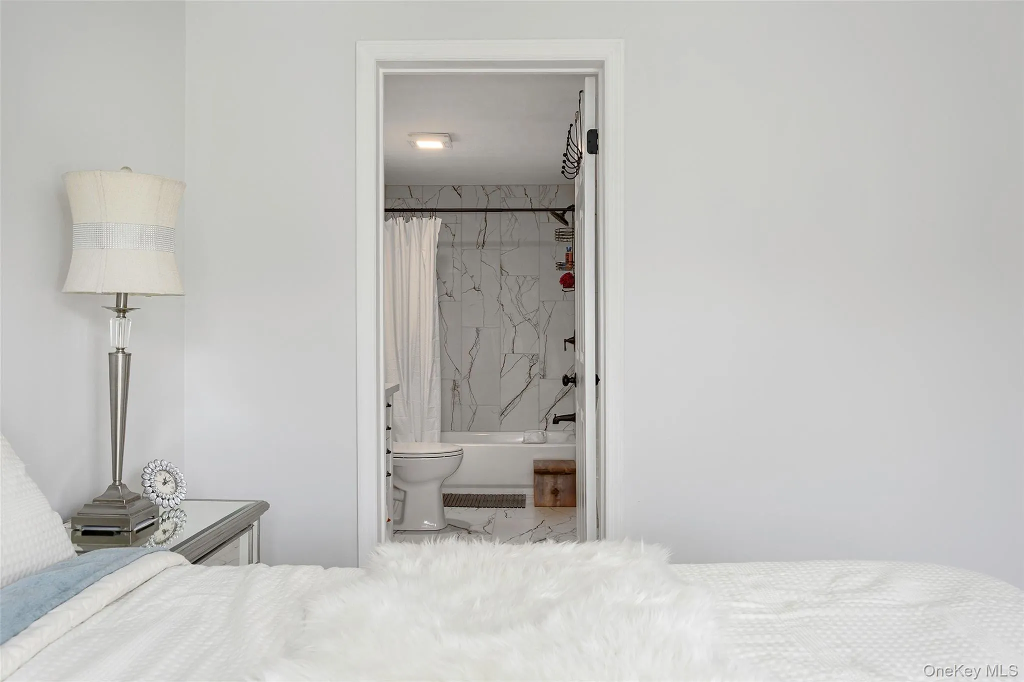 Bedroom featuring ensuite bathroom Bedroom featuring ensuite bathroom