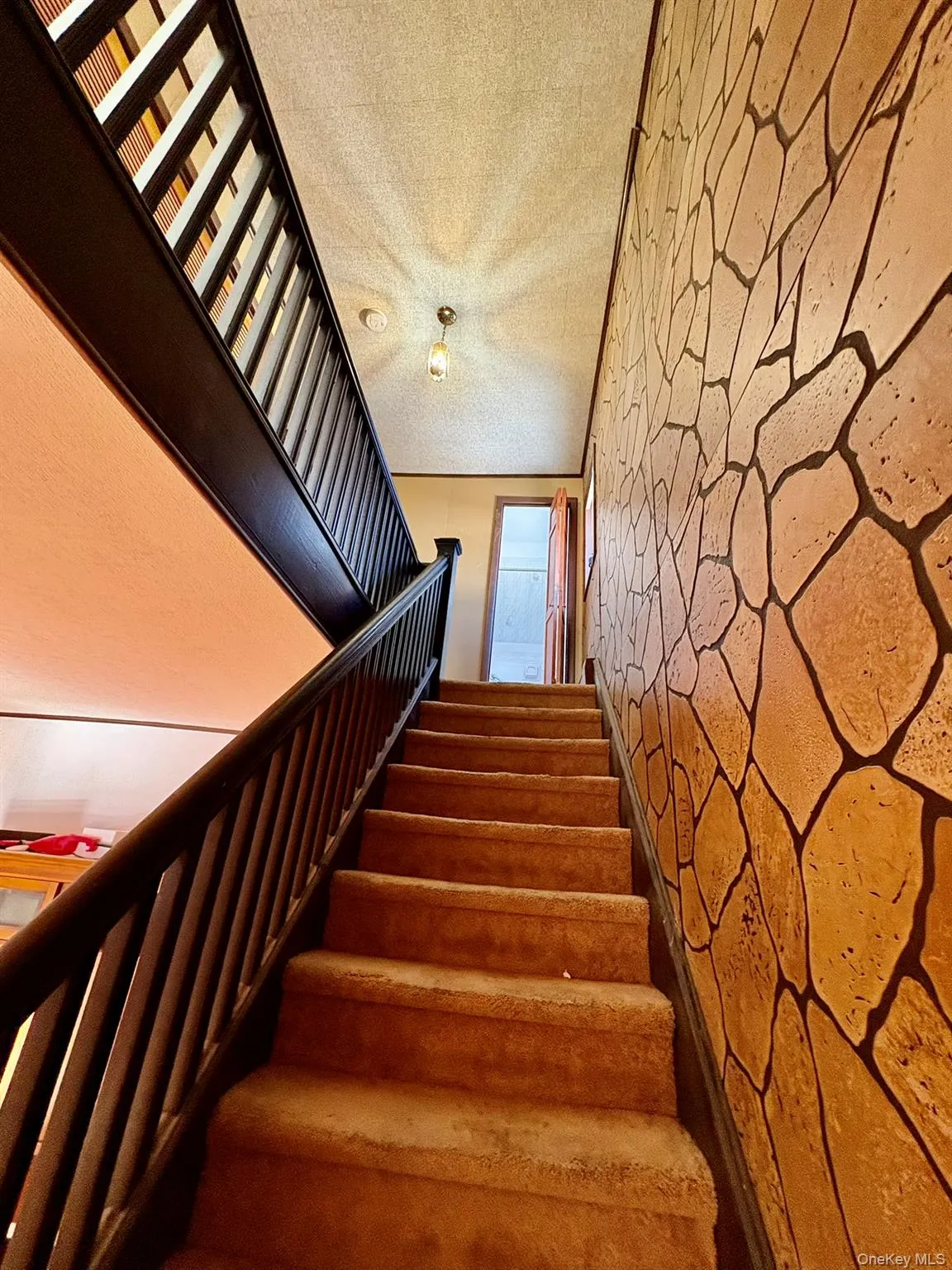 Stairway with a textured ceiling Stairway with a textured ceiling