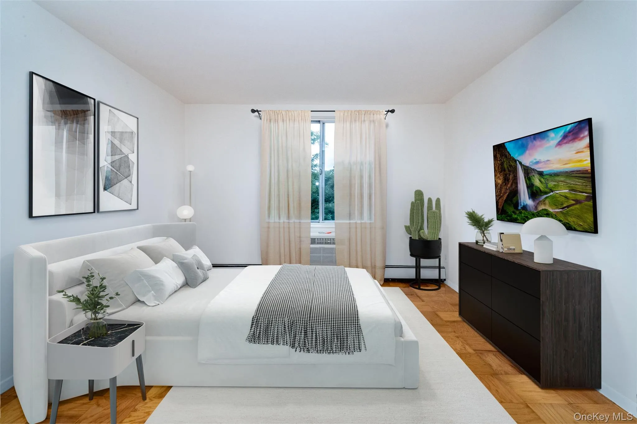 Bedroom featuring a baseboard radiator and baseboards Bedroom featuring a baseboard radiator and baseboards