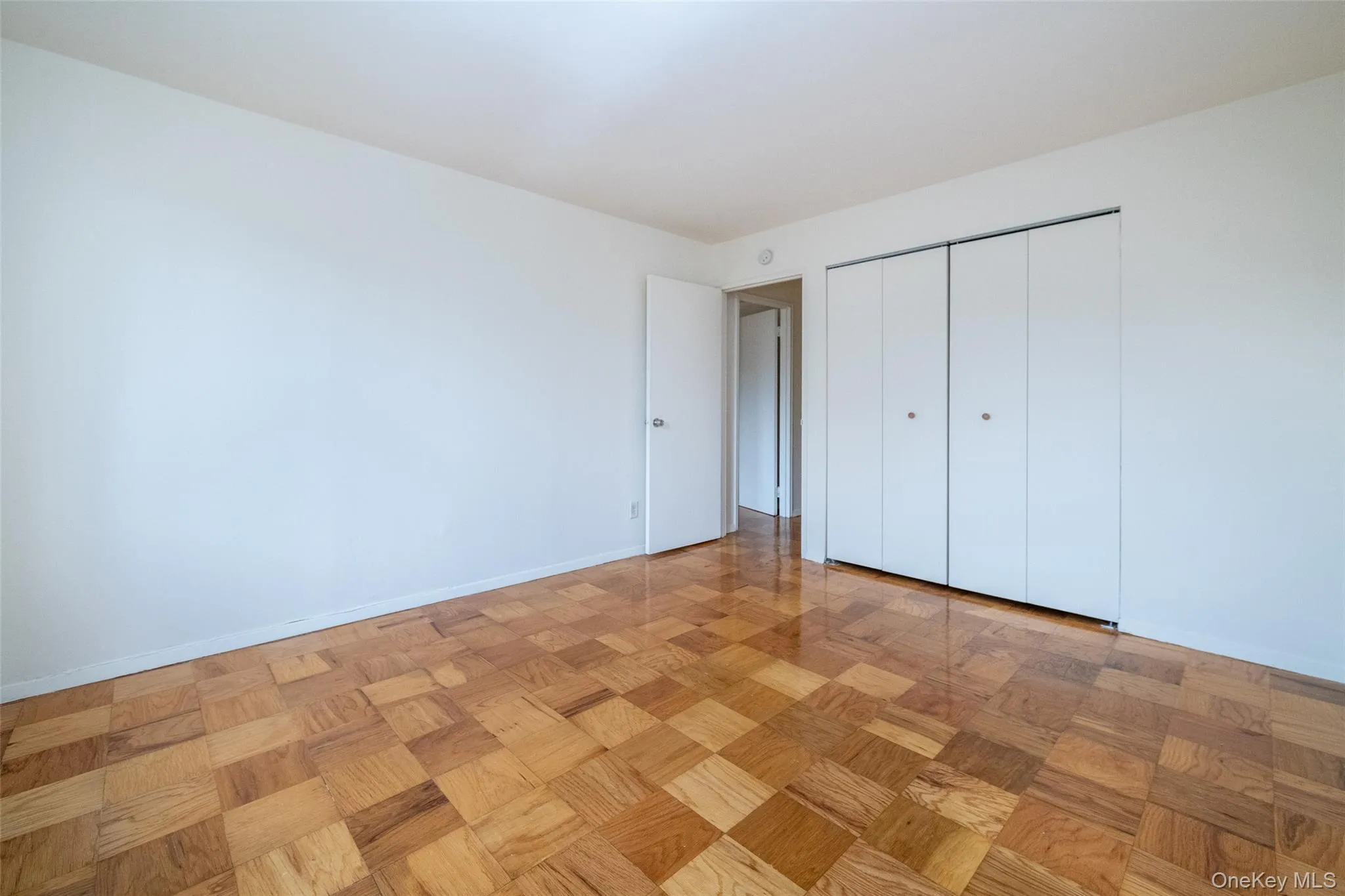 Unfurnished bedroom featuring a closet and baseboards Unfurnished bedroom featuring a closet and baseboards