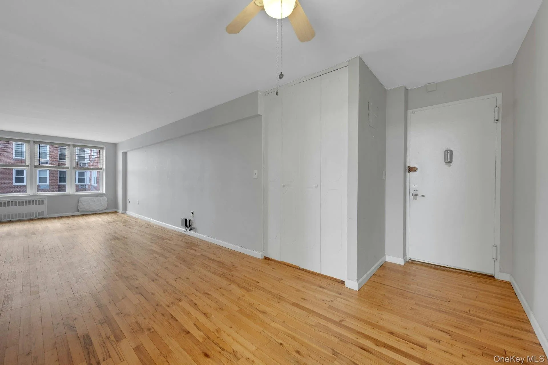Entry with partial View of Dining/Living Room Entry with partial View of Dining/Living Room