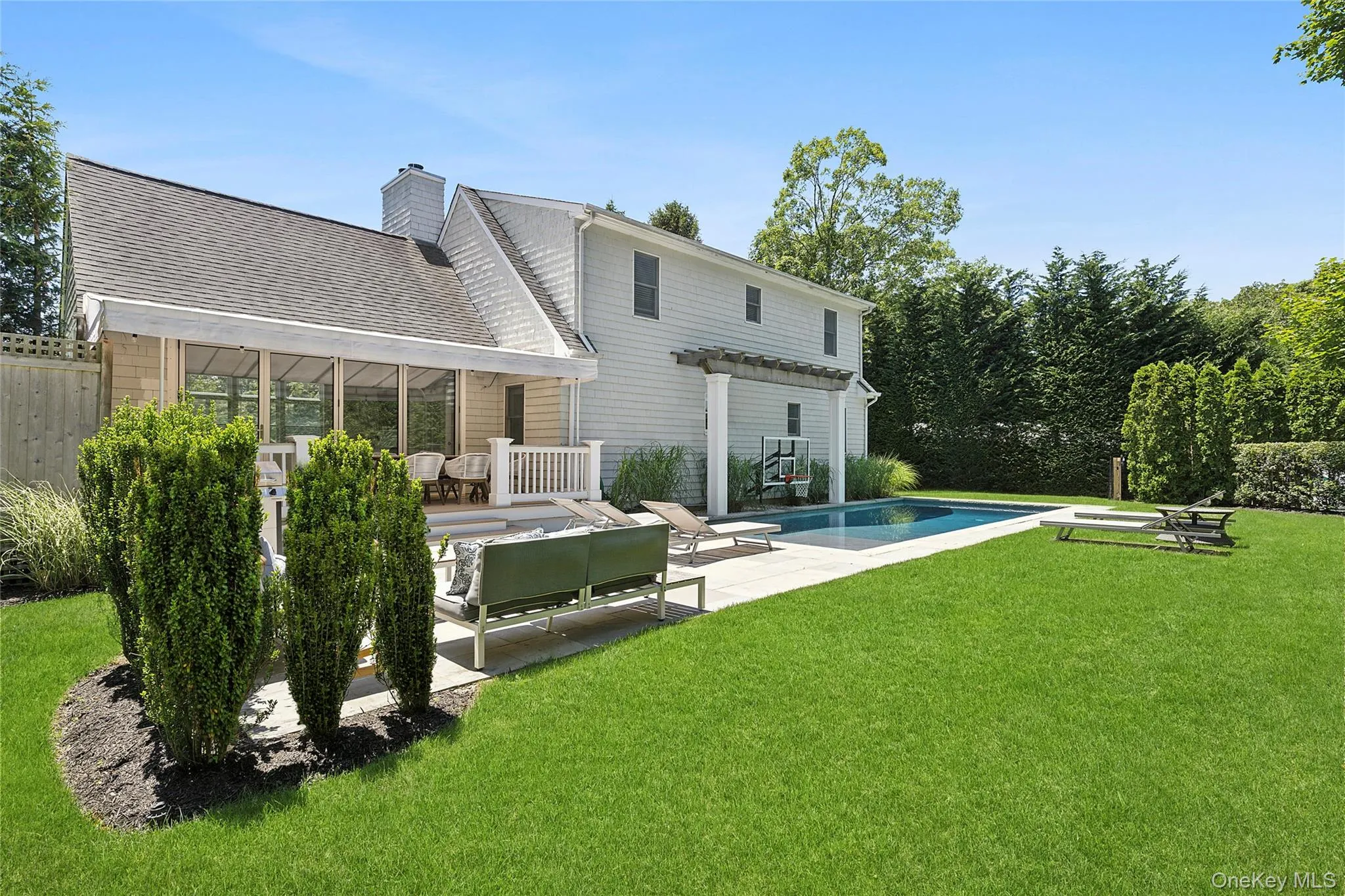 shingles, and an outdoor living space shingles, and an outdoor living space