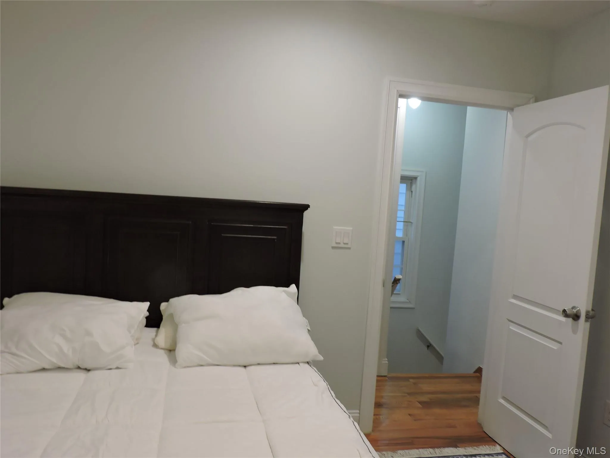 Bedroom with wood finished floors Bedroom with wood finished floors