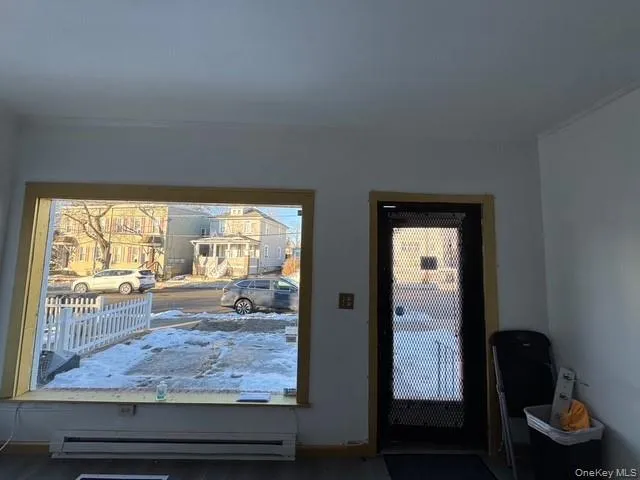 Interior of the storefront with large picture window for your business sign and extra natural lighting. Interior of the storefront with large picture window for your business sign and extra natural lighting.