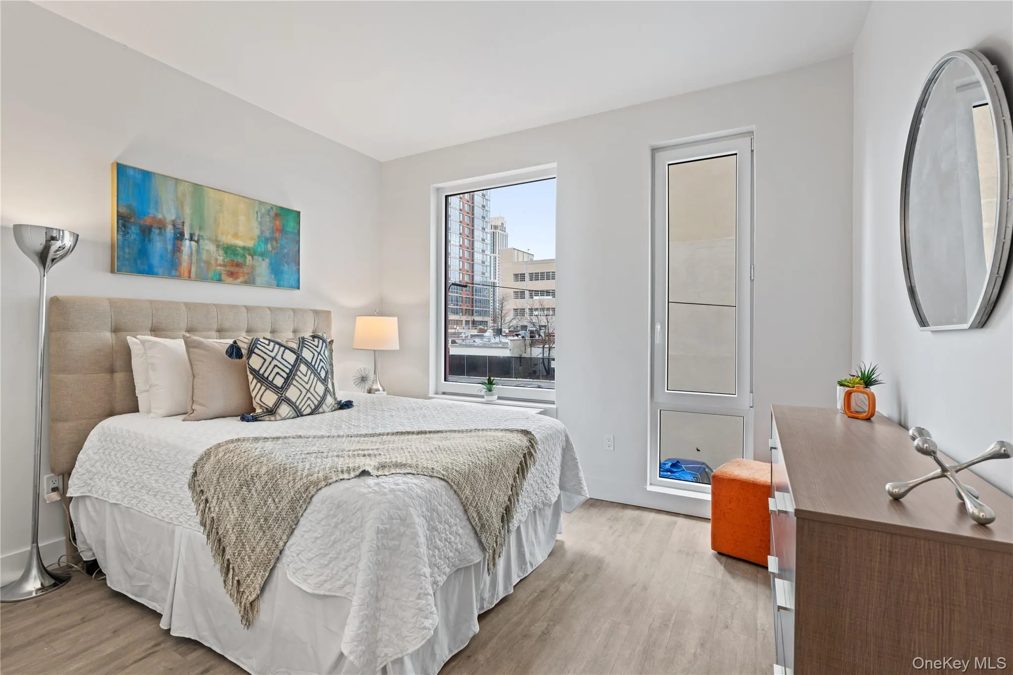 Bedroom featuring light wood-style flooring Bedroom featuring light wood-style flooring