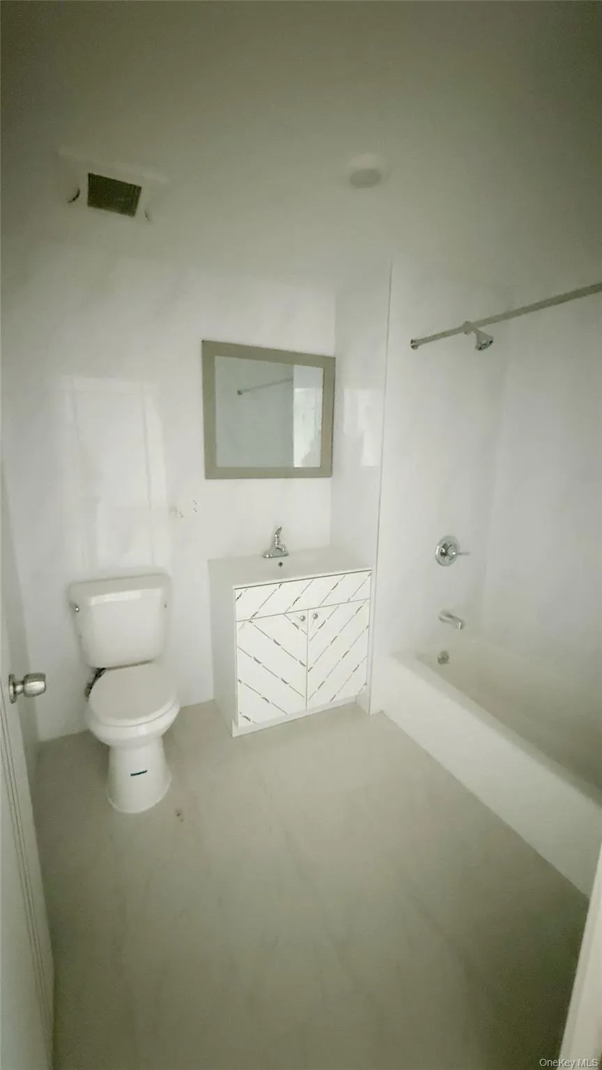 Full bath with shower / bathtub combination and vanity Full bath with shower / bathtub combination and vanity