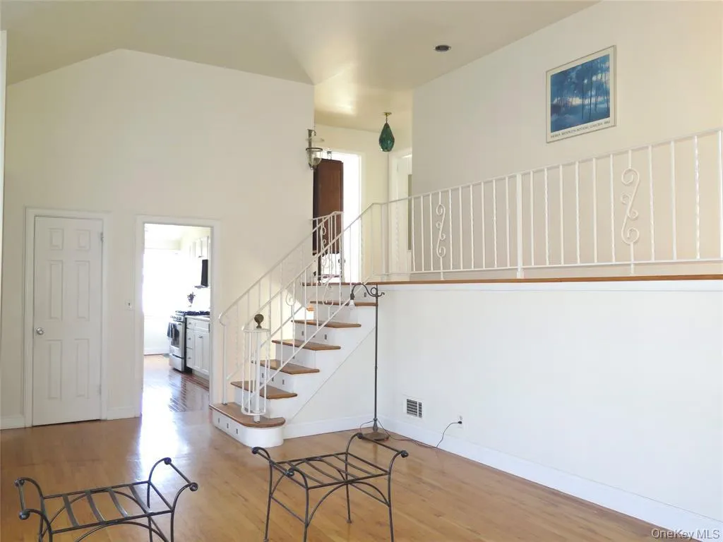 Stairs with wood finished floors and baseboards Stairs with wood finished floors and baseboards