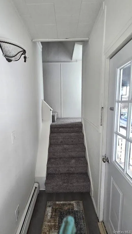 Staircase with baseboard heating Staircase with baseboard heating