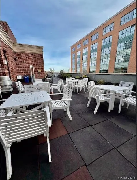 View of patio / terrace featuring outdoor dining space View of patio / terrace featuring outdoor dining space