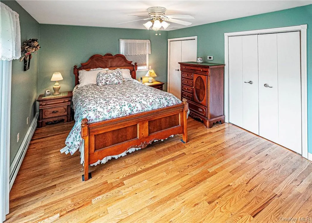 Primary Bedroom with Step-In Closet Primary Bedroom with Step-In Closet