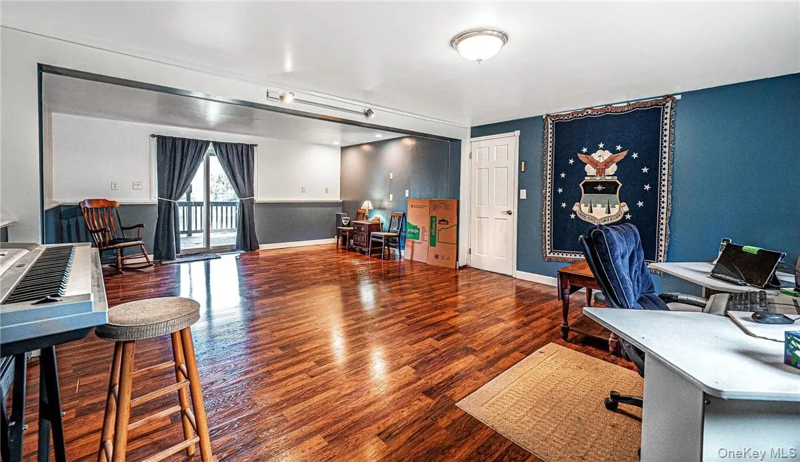 Lower Level Spacious All-Purpose room with access to lower deck Lower Level Spacious All-Purpose room with access to lower deck