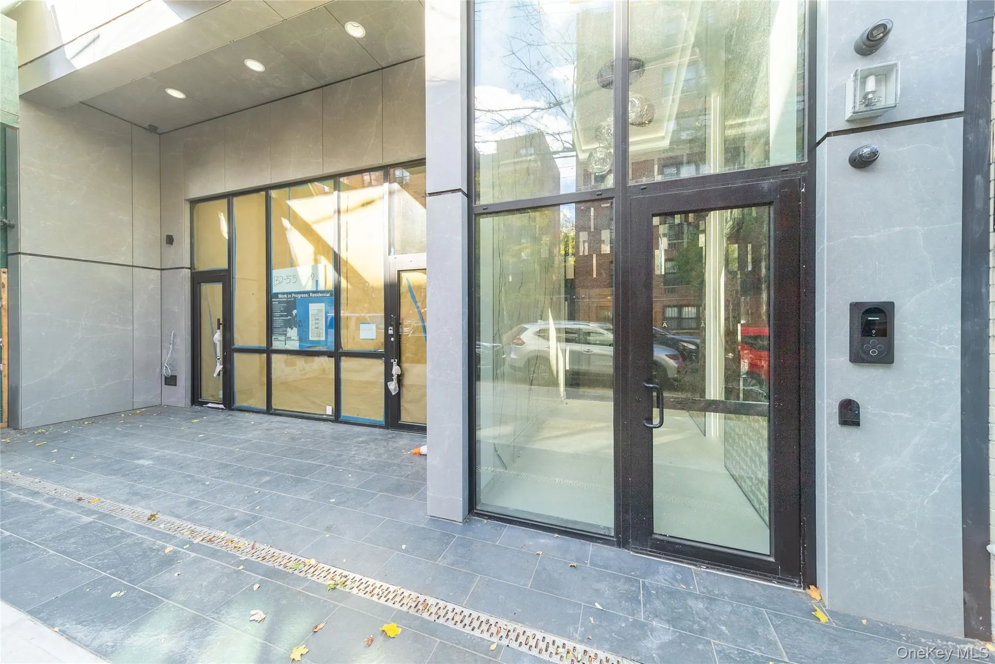 View of exterior entry featuring a patio View of exterior entry featuring a patio