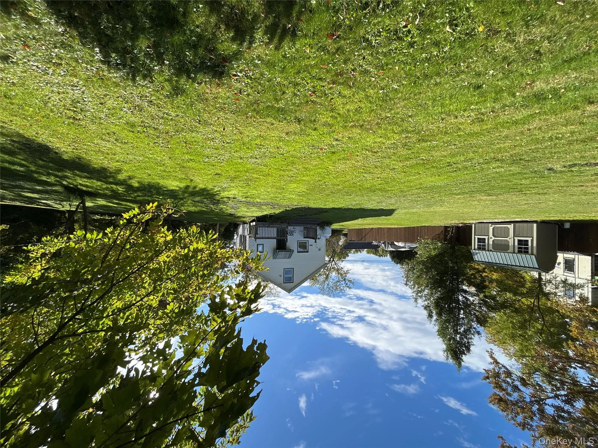 View of yard with a storage unit View of yard with a storage unit
