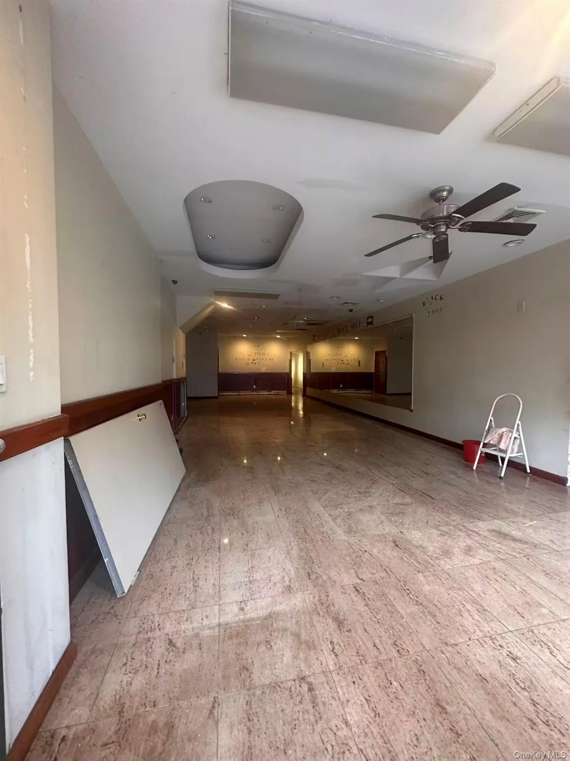 Miscellaneous room featuring a ceiling fan Miscellaneous room featuring a ceiling fan
