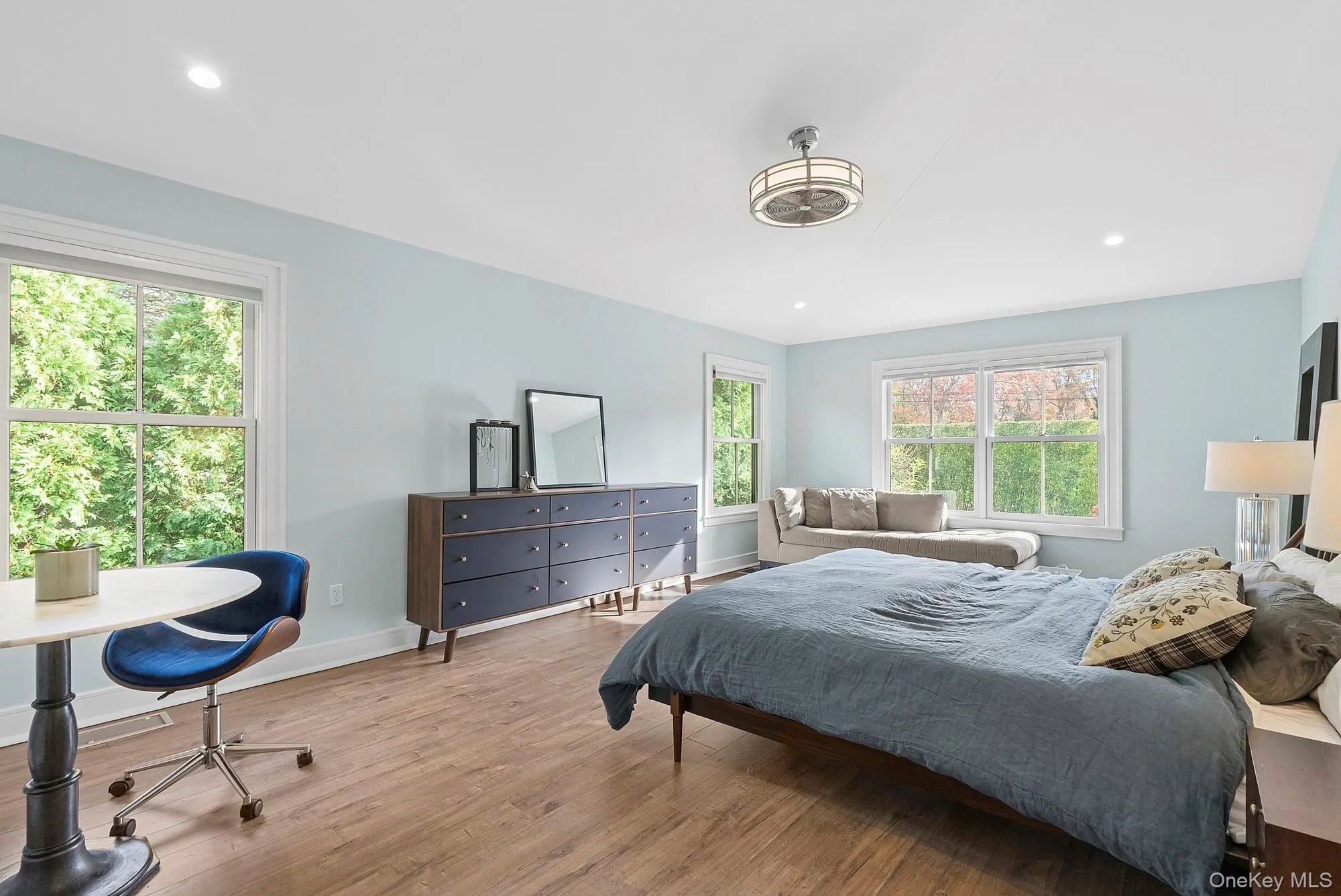 Bedroom featuring wood finished floors and recessed lighting Bedroom featuring wood finished floors and recessed lighting