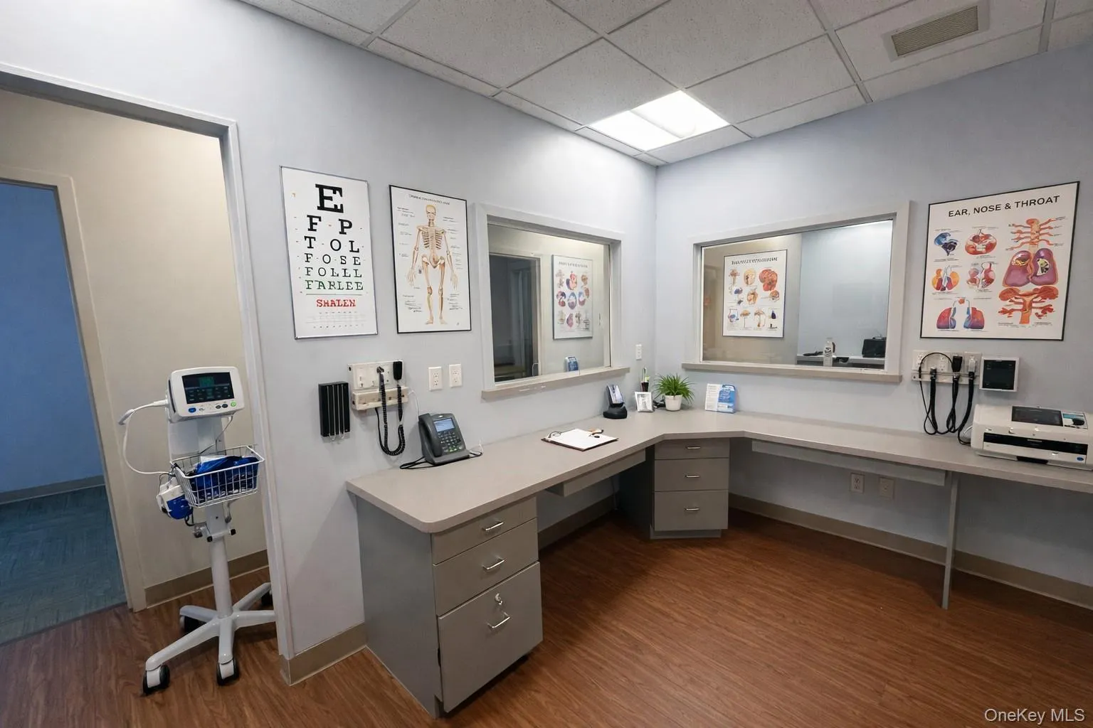 Office featuring built in desk and a paneled ceiling Office featuring built in desk and a paneled ceiling