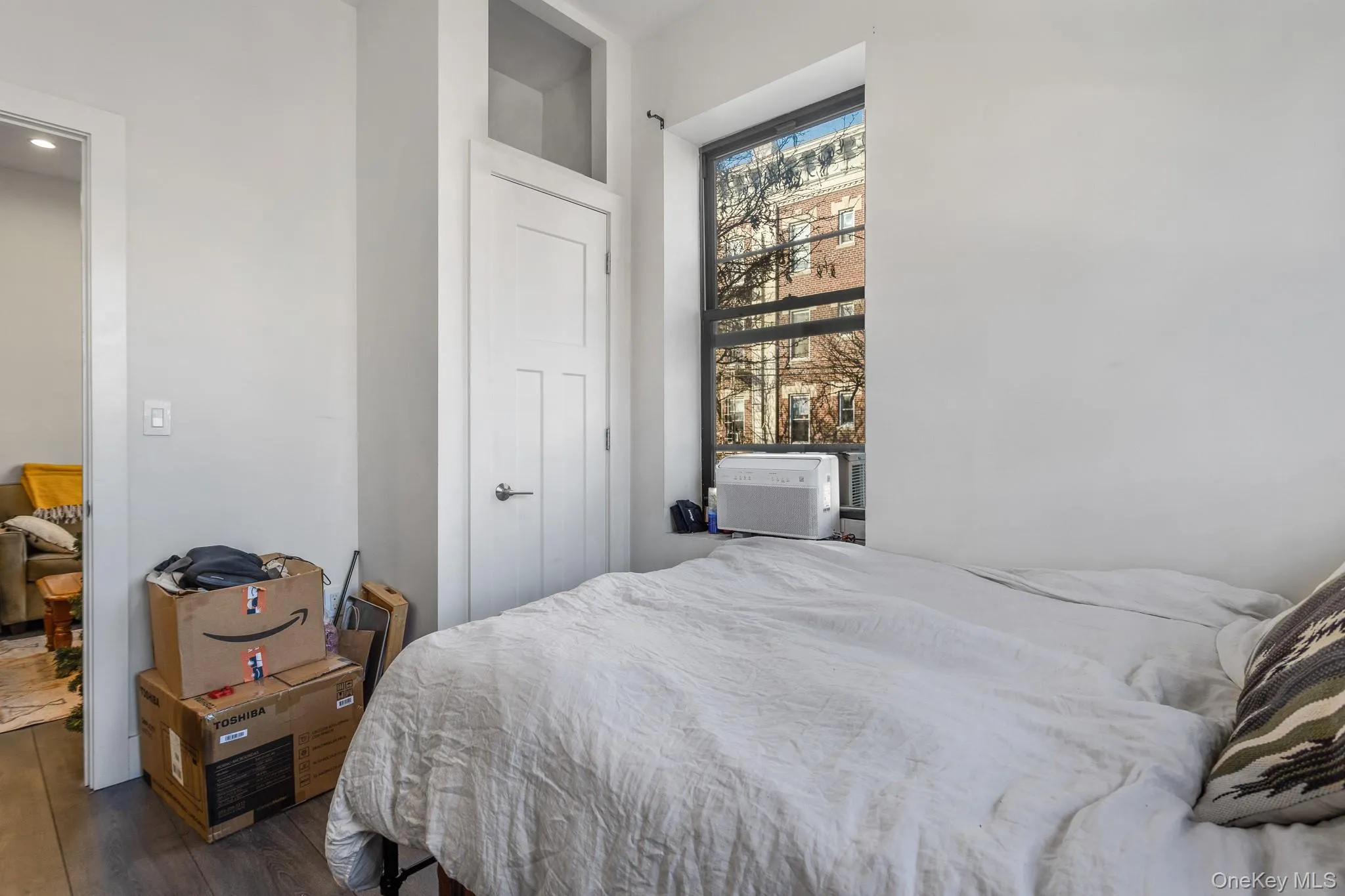Bedroom with wood finished floors Bedroom with wood finished floors
