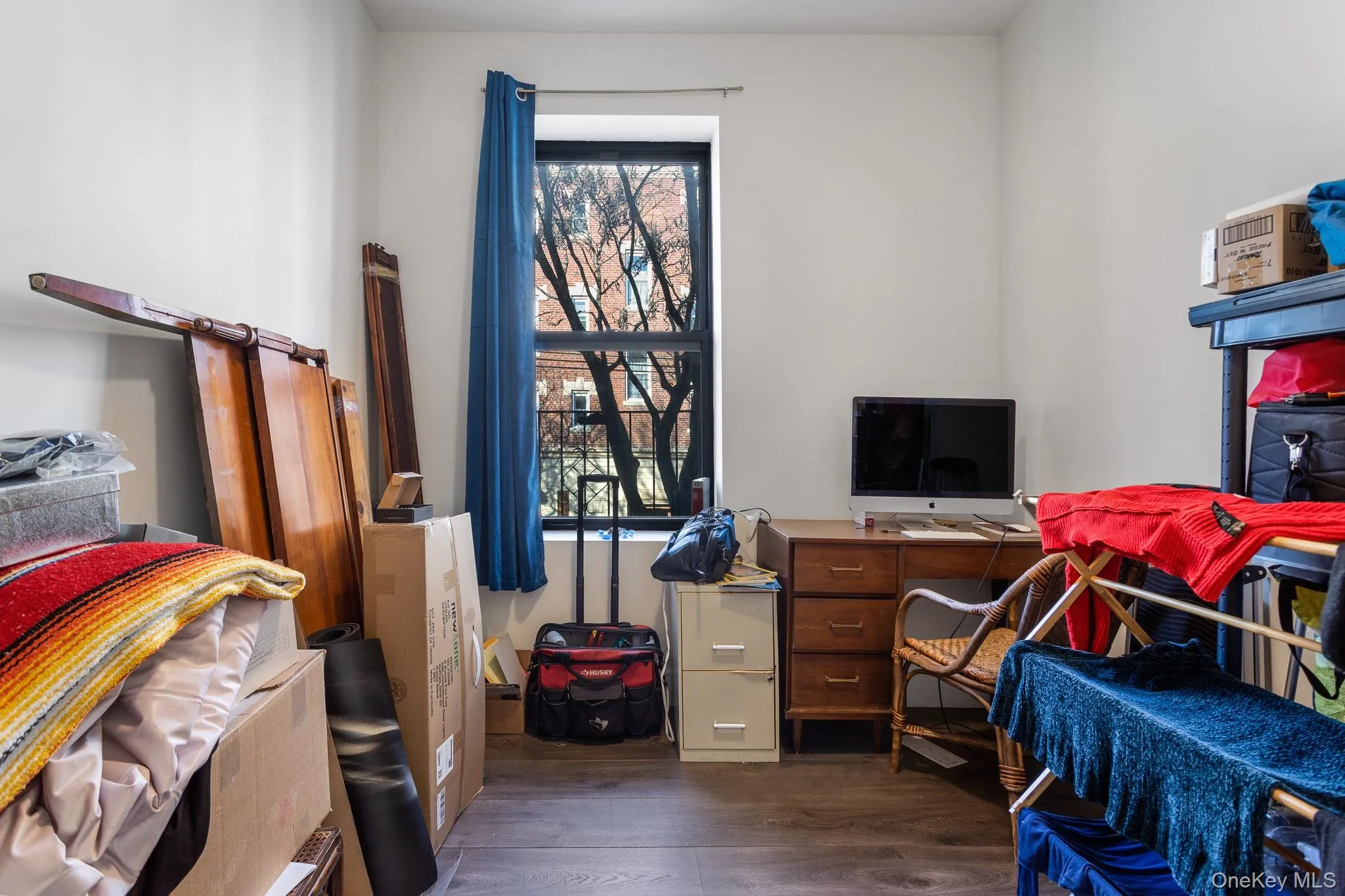 Office space featuring dark wood finished floors Office space featuring dark wood finished floors