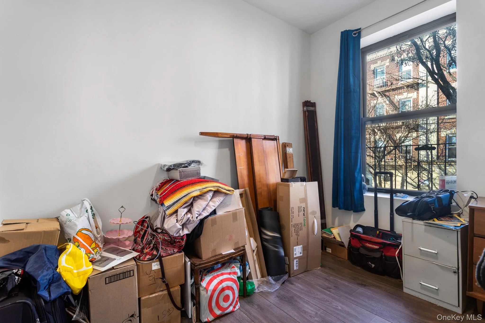 Misc room featuring wood finished floors Misc room featuring wood finished floors