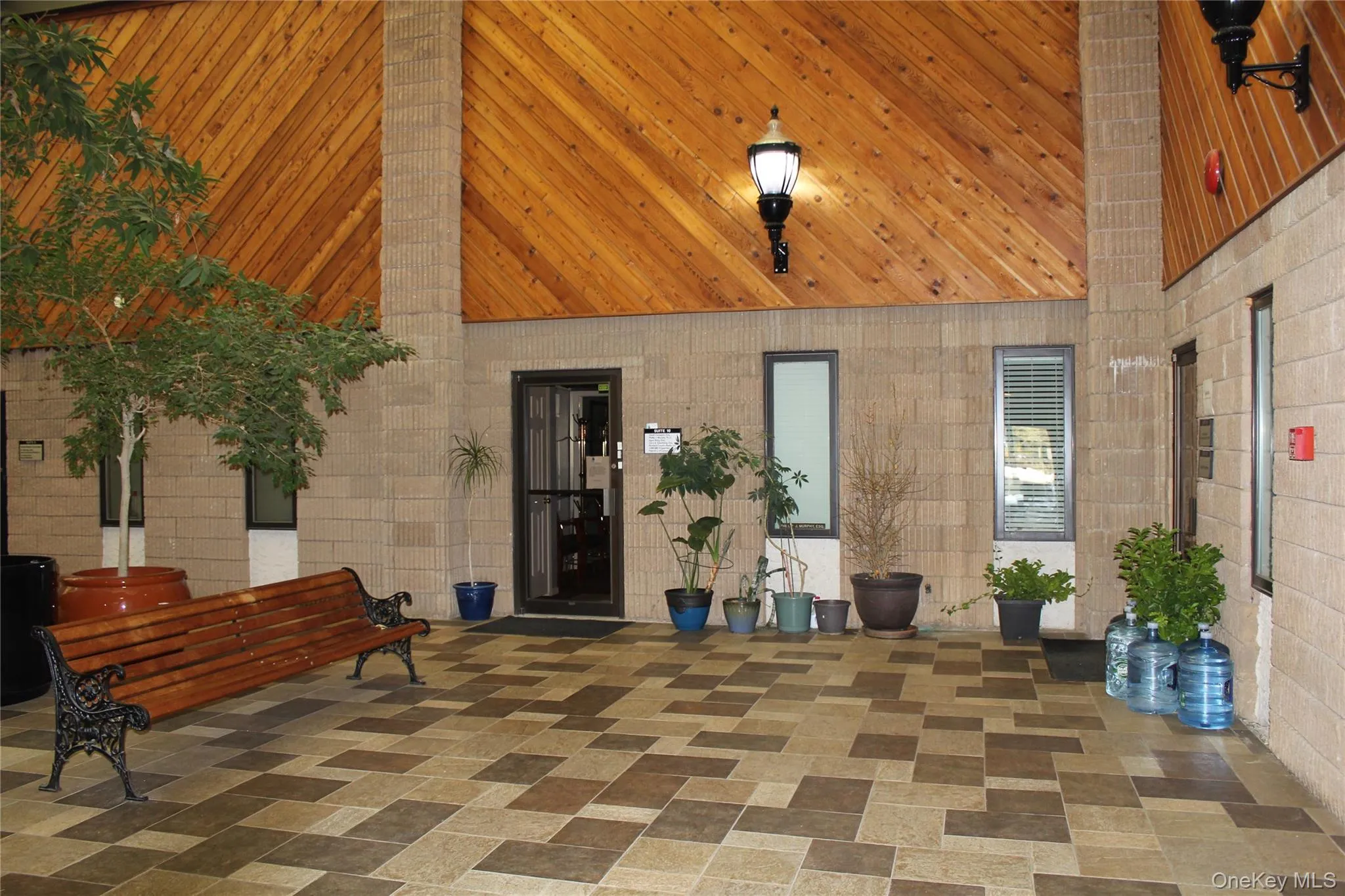 Community lobby featuring high vaulted ceiling Community lobby featuring high vaulted ceiling