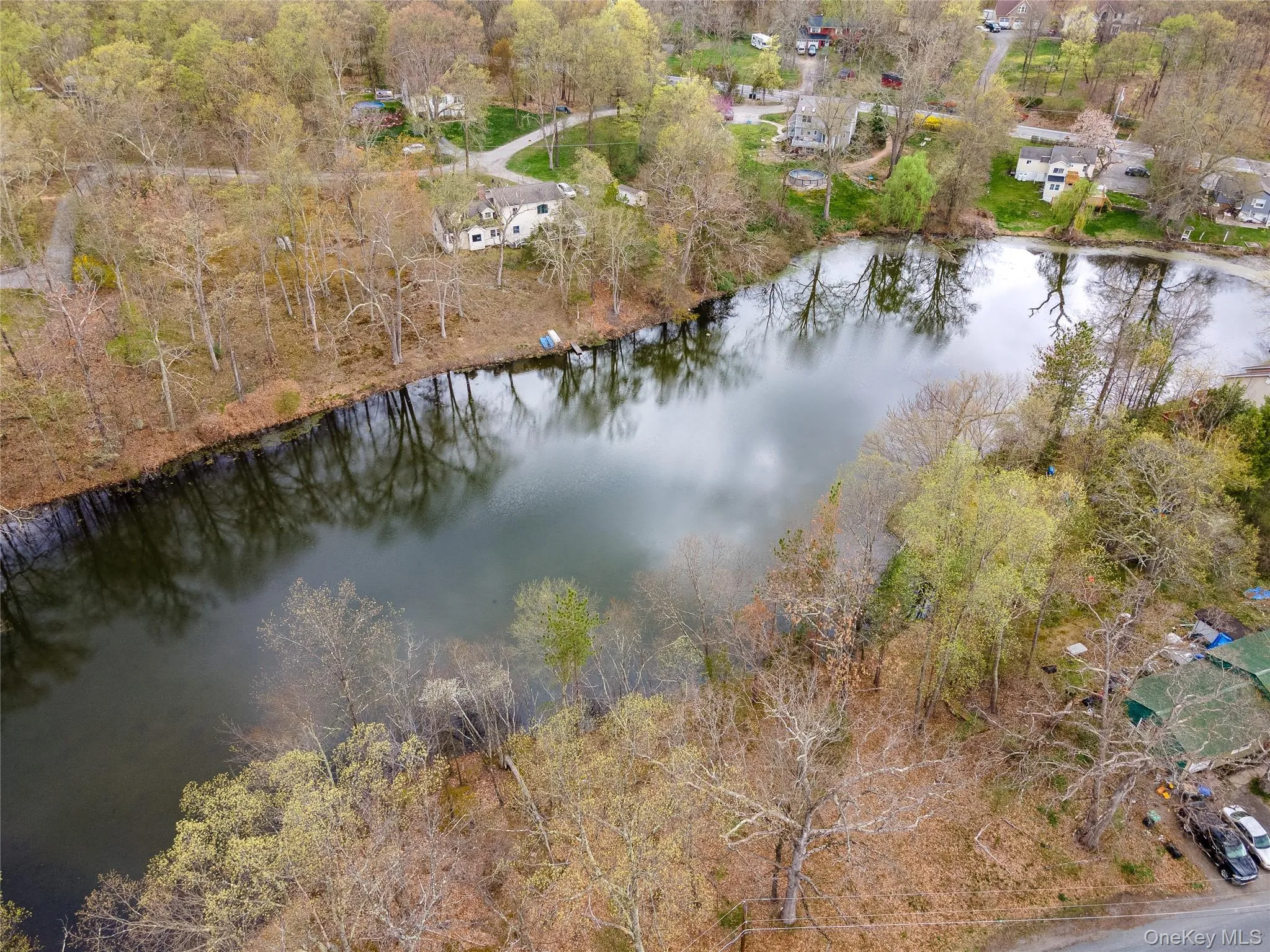 Aerial overview of property's location with a large body of water Aerial overview of property's location with a large body of water
