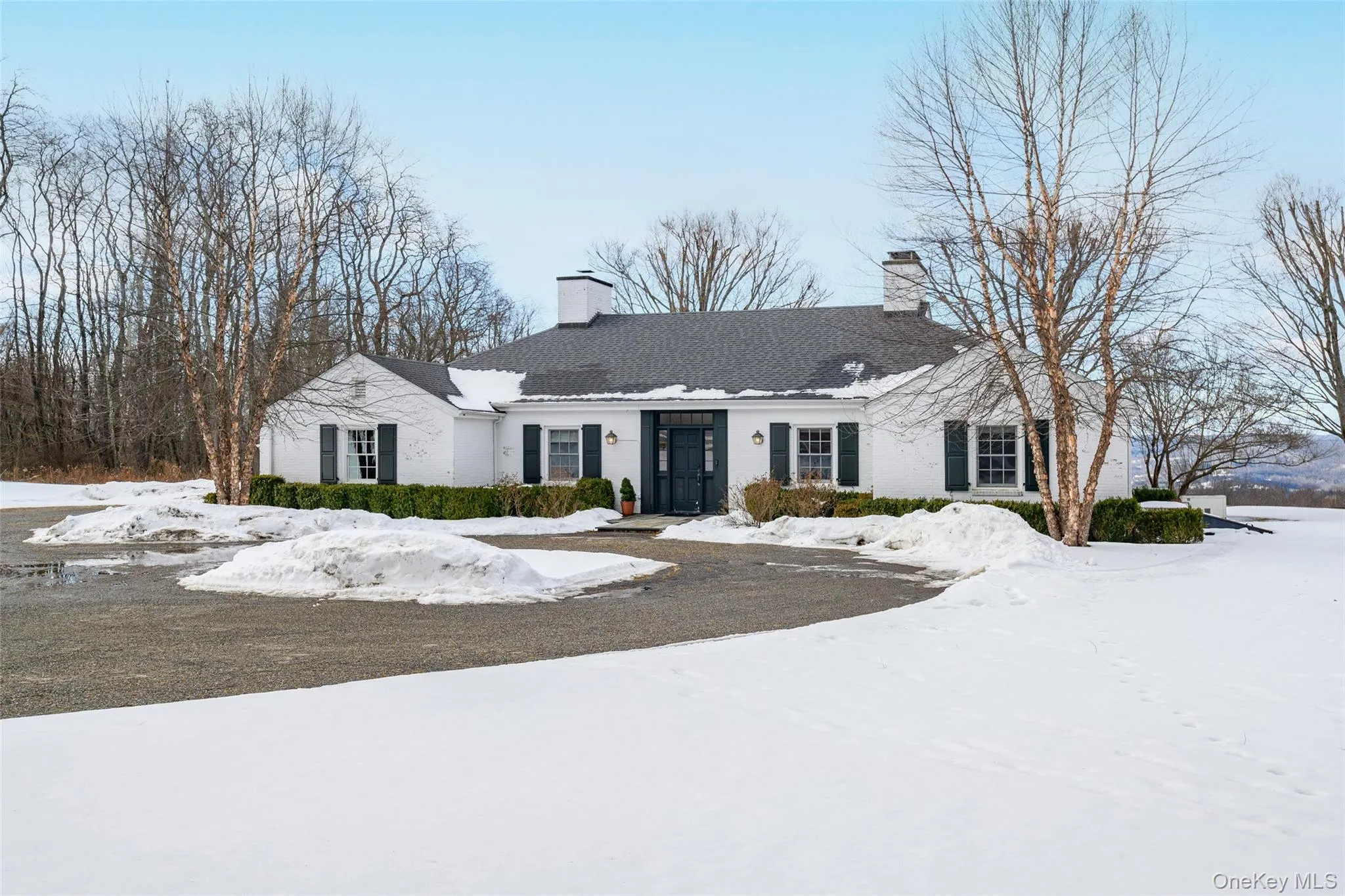 View of front of house with a chimney View of front of house with a chimney