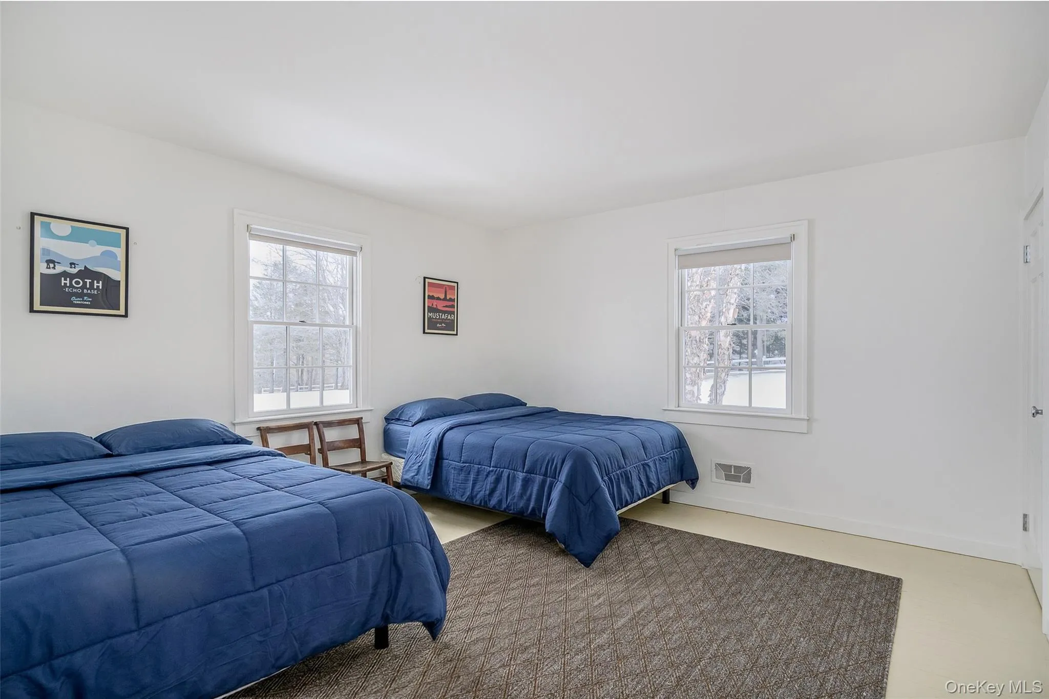 Bedroom with multiple windows Bedroom with multiple windows